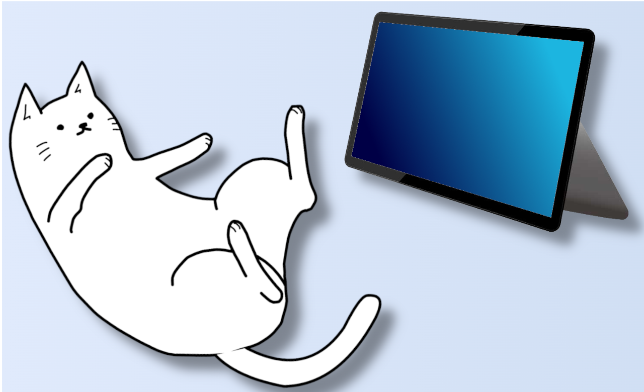 寝っ転がっている猫とタブレットの画像