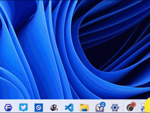 タスクバーにある「Vivaldi」ブラウザのPWAアプリをドラッグ&ドロップで移動しているGIF画像